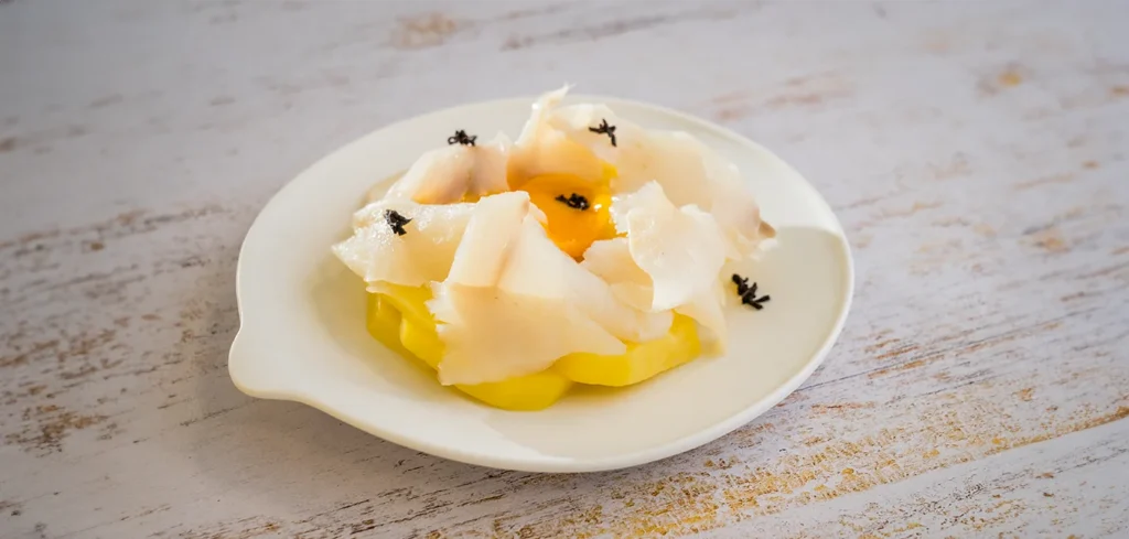 Bacalao ahumado Martiko con patata panadera, huevo a baja temperatura y trufa